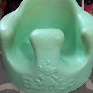 Light green Bumbo floor seat